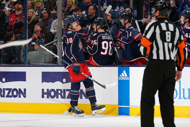 Dec 29, 2023; Columbus, Ohio, USA; Columbus Blue Jackets left wing Dmitri Voronkov (10) celebrates his goal against the Toronto Maple Leafs during the second period at Nationwide Arena. Mandatory Credit: Russell LaBounty-USA TODAY Sports