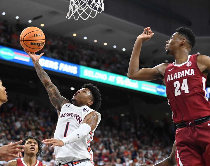 Feb 11, 2023; Auburn, Alabama, USA;  Auburn Tigers guard Wendell Green Jr. (1) shoots defended by Alabama Crimson Tide forward Brandon Miller (24) at Neville Arena. Mandatory Credit: Julie Bennett-USA TODAY Sports

