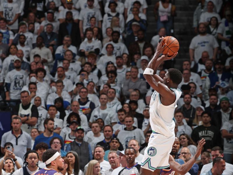 MINNEAPOLIS, MN -  APRIL 23: Anthony Edwards #5 of the Minnesota Timberwolves shoots the ball during the game against the Phoenix Suns during Round 1 Game 2 of the 2024 NBA Playoffs on April 23, 2024 at Target Center in Minneapolis, Minnesota. NOTE TO USER: User expressly acknowledges and agrees that, by downloading and or using this Photograph, user is consenting to the terms and conditions of the Getty Images License Agreement. Mandatory Copyright Notice: Copyright 2024 NBAE (Photo by David Sherman/NBAE via Getty Images)