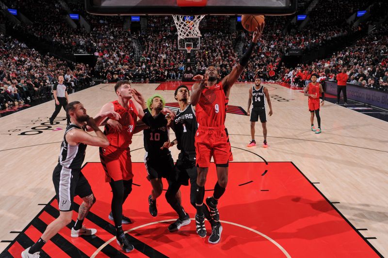 PORTLAND, OR - DECEMBER 13: Jerami Grant #9 of the Portland Trail Blazers drives to the basket during the game against the San Antonio Spurs on December 13, 2024 at the Moda Center Arena in Portland, Oregon. NOTE TO USER: User expressly acknowledges and agrees that, by downloading and or using this photograph, user is consenting to the terms and conditions of the Getty Images License Agreement. Mandatory Copyright Notice: Copyright 2024 NBAE (Photo by Cameron Browne/NBAE via Getty Images)