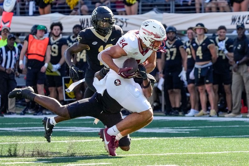 Oct 28, 2023; Winston-Salem, North Carolina, USA;  Florida State Seminoles tight end Kyle Morlock (84) makes a catch against the Wake Forest Demon Deacons during the second half at Allegacy Federal Credit Union Stadium. Mandatory Credit: Jim Dedmon-USA TODAY Sports