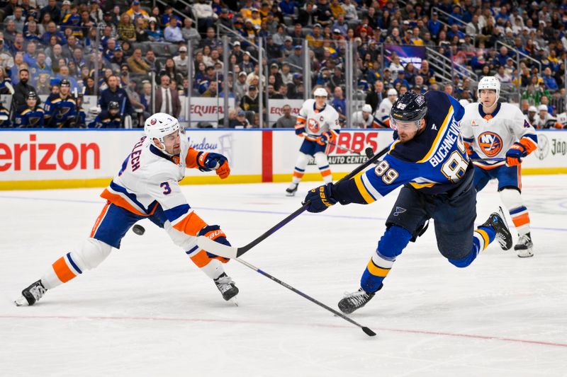 Oct 17, 2024; St. Louis, Missouri, USA;  St. Louis Blues left wing Pavel Buchnevich (89) shoots against New York Islanders defenseman Adam Pelech (3) during the second period at Enterprise Center. Mandatory Credit: Jeff Curry-Imagn Images