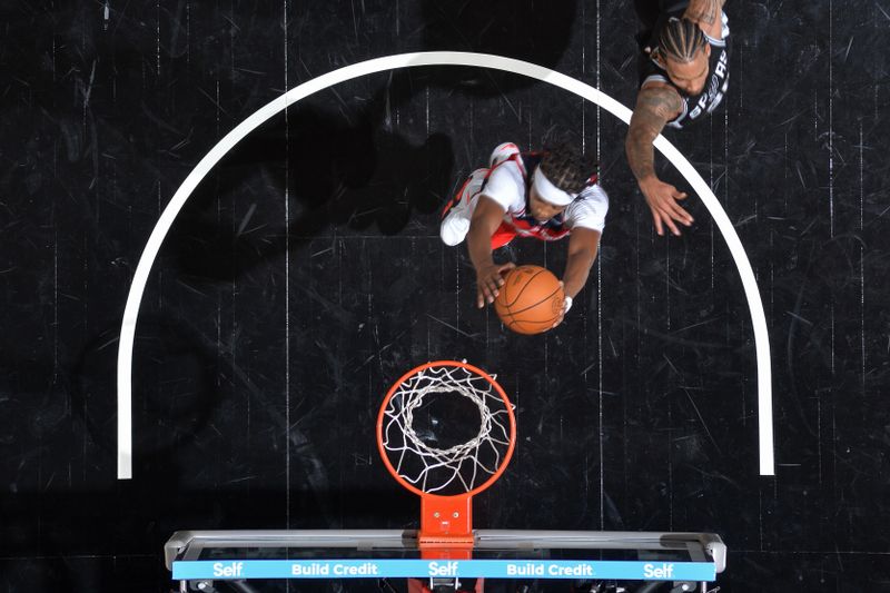 SAN ANTONIO, TX - NOVEMBER 13: Bilal Coulibaly #0 of the Washington Wizards dunks the ball during the game against the San Antonio Spurs on November 13, 2024 at the Frost Bank Center in San Antonio, Texas. NOTE TO USER: User expressly acknowledges and agrees that, by downloading and or using this photograph, user is consenting to the terms and conditions of the Getty Images License Agreement. Mandatory Copyright Notice: Copyright 2024 NBAE (Photos by Michael Gonzales/NBAE via Getty Images)