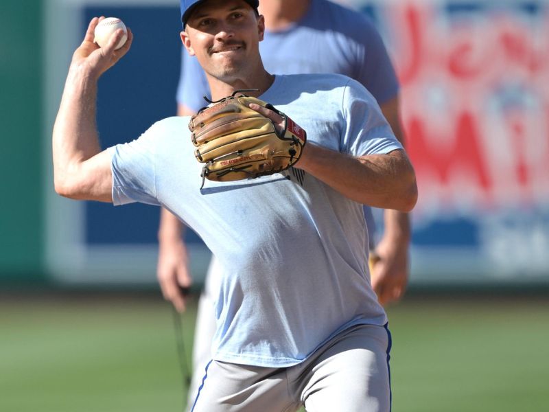 May 9, 2024; Anaheim, California, USA;  Kansas City Royals second base Adam Frazier (26) warms up prior to the game against the Los Angeles Angels at Angel Stadium. Mandatory Credit: Jayne Kamin-Oncea-USA TODAY Sports