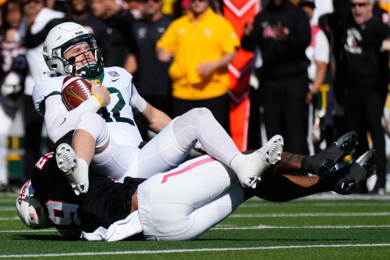 Nov 4, 2023; Waco, Texas, USA; Baylor Bears quarterback Blake Shapen (12) is sacked by Houston Cougars linebacker Treylin Payne (29)  during the first half at McLane Stadium. Mandatory Credit: Chris Jones-USA TODAY Sports