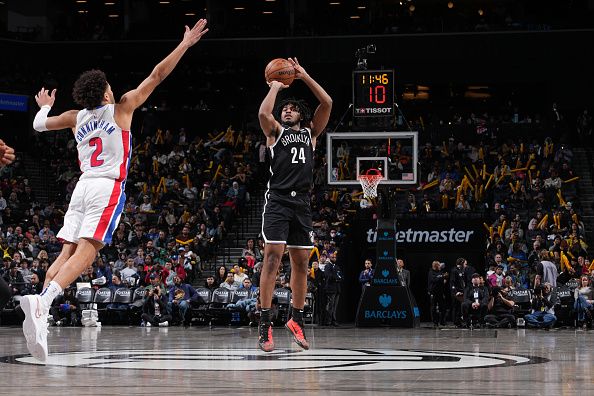 BROOKLYN, NY - DECEMBER 23: Cam Thomas #24 of the Brooklyn Nets shoots a three point basket against the Detroit Pistons on December 23, 2023 at Barclays Center in Brooklyn, New York. NOTE TO USER: User expressly acknowledges and agrees that, by downloading and or using this Photograph, user is consenting to the terms and conditions of the Getty Images License Agreement. Mandatory Copyright Notice: Copyright 2023 NBAE (Photo by Jesse D. Garrabrant/NBAE via Getty Images)