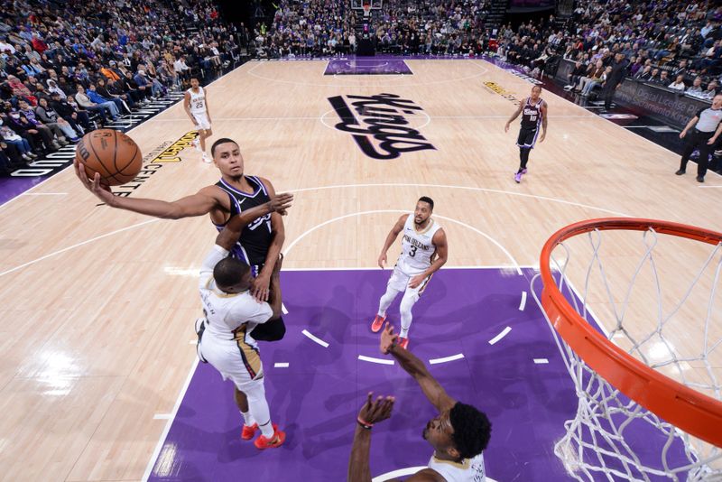 SACRAMENTO, CA - FEBRUARY 8:  Keegan Murray #13 of the Sacramento Kings drives to the basket during the game against the New Orleans Pelicans on February 8, 2025 at Golden 1 Center in Sacramento, California. NOTE TO USER: User expressly acknowledges and agrees that, by downloading and or using this Photograph, user is consenting to the terms and conditions of the Getty Images License Agreement. Mandatory Copyright Notice: Copyright 2025 NBAE (Photo by Rocky Widner/NBAE via Getty Images)