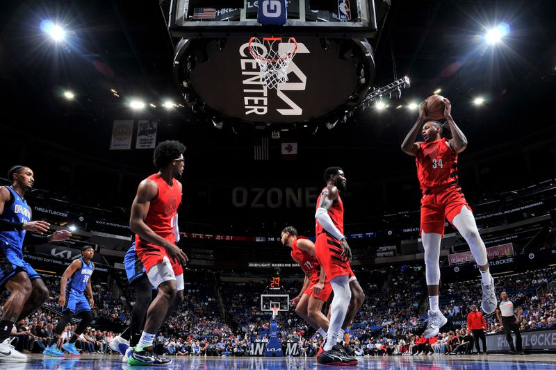 ORLANDO, FL - APRIL 1: Jabari Walker #34 of the Portland Trail Blazers grabs a rebound during the game against the Orlando Magic on April 1, 2024 at Kia Center in Orlando, Florida. NOTE TO USER: User expressly acknowledges and agrees that, by downloading and or using this photograph, User is consenting to the terms and conditions of the Getty Images License Agreement. Mandatory Copyright Notice: Copyright 2024 NBAE (Photo by Fernando Medina/NBAE via Getty Images)