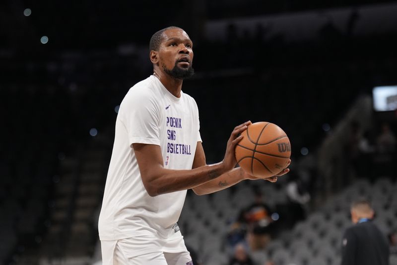 SAN ANTONIO, TX - MARCH 23: Kevin Durant #35 of the Phoenix Suns warms up before the game against the San Antonio Spurs on March 23, 2024 at the Frost Bank Center in San Antonio, Texas. NOTE TO USER: User expressly acknowledges and agrees that, by downloading and or using this photograph, user is consenting to the terms and conditions of the Getty Images License Agreement. Mandatory Copyright Notice: Copyright 2024 NBAE (Photos by Jesse D. Garrabrant/NBAE via Getty Images)