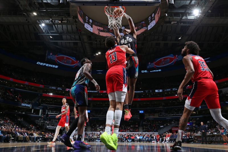 WASHINGTON, DC -? MARCH 27:  Noah Clowney #21 of the Brooklyn Nets  shoots the ball during the game against the Washington Wizards on March 27, 2024 at Capital One Arena in Washington, DC. NOTE TO USER: User expressly acknowledges and agrees that, by downloading and or using this Photograph, user is consenting to the terms and conditions of the Getty Images License Agreement. Mandatory Copyright Notice: Copyright 2024 NBAE (Photo by Stephen Gosling/NBAE via Getty Images)