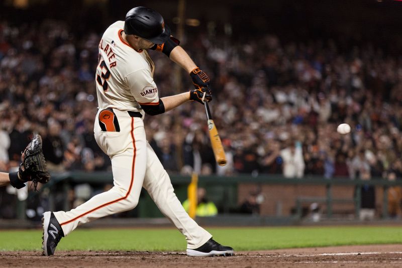 Jun 10, 2024; San Francisco, California, USA; San Francisco Giants pinch hitter Austin Slater (13) hits a walk-off RBI single against the Houston Astros during the tenth inning at Oracle Park. Mandatory Credit: John Hefti-USA TODAY Sports