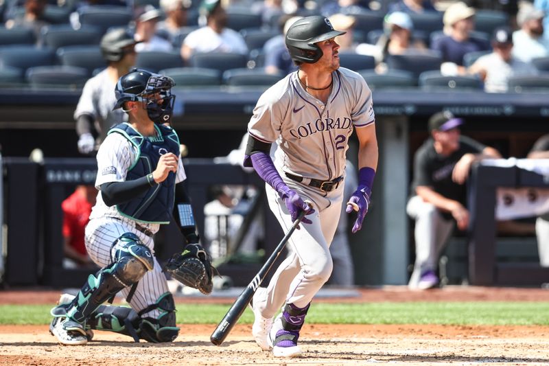 Aug 24, 2024; Bronx, New York, USA;  Colorado Rockies left fielder Nolan Jones (22) hits a two run doube in the third inning against the New York Yankees at Yankee Stadium. Mandatory Credit: Wendell Cruz-USA TODAY Sports
