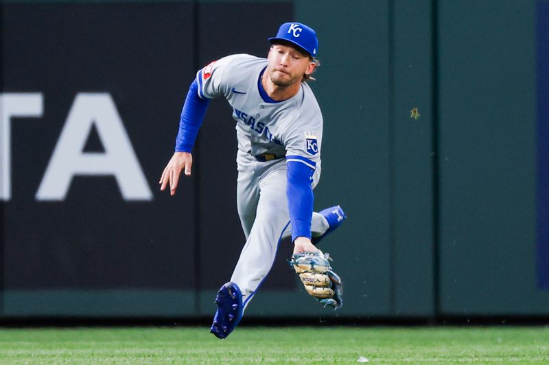 Jun 30, 2025; Seattle, Washington, USA; Kansas City Royals left fielder Drew Waters (8) catches a fly ball against the Seattle Mariners during the eighth inning at T-Mobile Park. Mandatory Credit: Joe Nicholson-Imagn Images