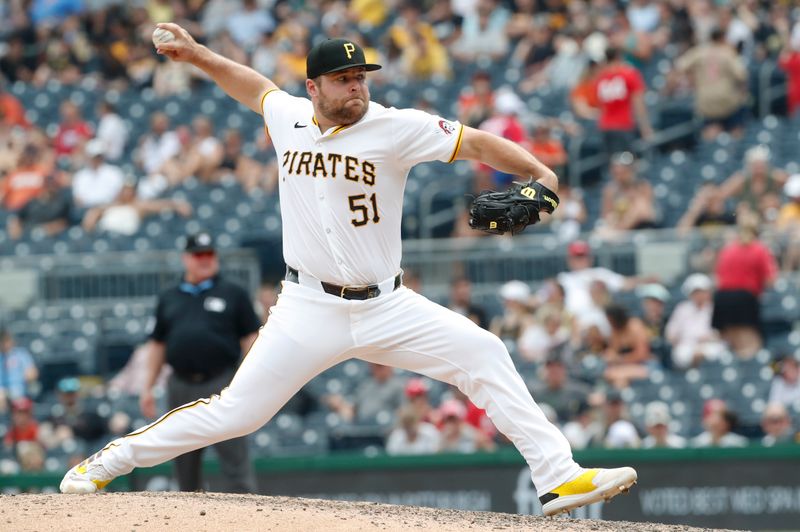 Jun 19, 2024; Pittsburgh, Pennsylvania, USA;  Pittsburgh Pirates relief pitcher David Bednar (51) pitches against the Cincinnati Reds during the ninth inning at PNC Park. The Pirates shutout the Reds 1-0. Mandatory Credit: Charles LeClaire-USA TODAY Sports