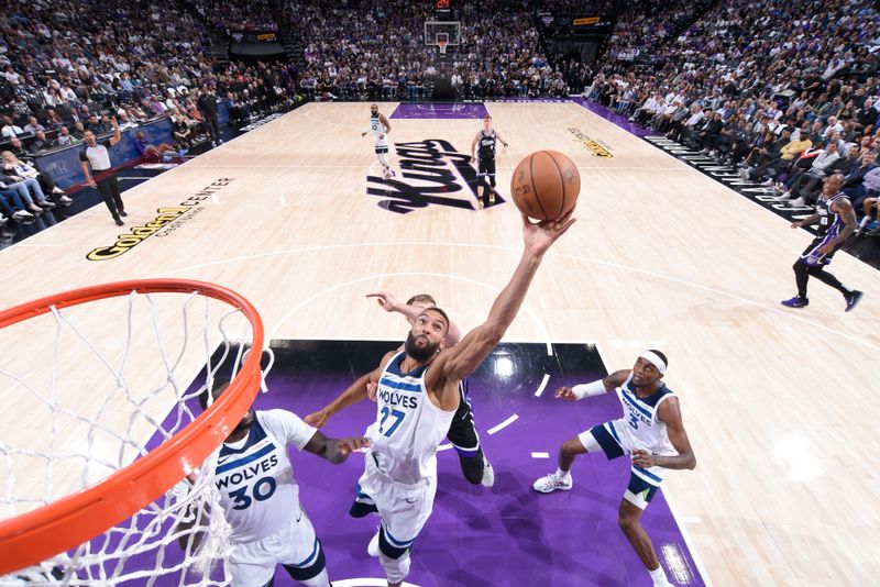 SACRAMENTO, CA - OCTOBER 24: Rudy Gobert #27 of the Minnesota Timberwolves rebounds the ball during the game against the Sacramento Kings on October 24, 2024 at Golden 1 Center in Sacramento, California. NOTE TO USER: User expressly acknowledges and agrees that, by downloading and or using this Photograph, user is consenting to the terms and conditions of the Getty Images License Agreement. Mandatory Copyright Notice: Copyright 2024 NBAE (Photo by Rocky Widner/NBAE via Getty Images)