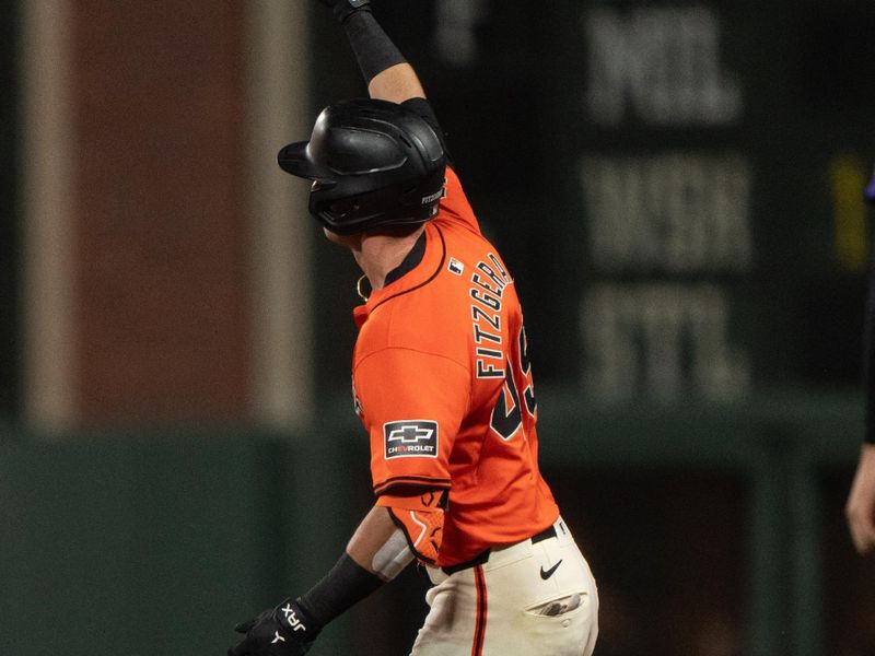 Jul 26, 2024; San Francisco, California, USA;  San Francisco Giants outfielder Tyler Fitzgerald (49) celebrates after hitting a two run home run during the sixth inning against the Colorado Rockies at Oracle Park. Mandatory Credit: Stan Szeto-USA TODAY Sports