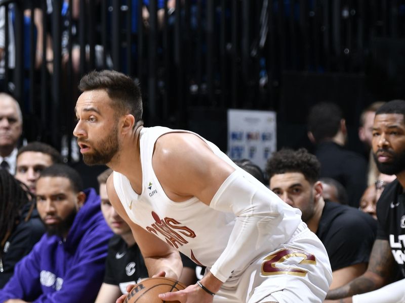 ORLANDO, FL - APRIL 27: Max Strus #1 of the Cleveland Cavaliers looks to pass the ball during the game against the Orlando Magic during Round 1 Game 4 of the 2024 NBA Playoffs on April 27, 2024 at the Kia Center in Orlando, Florida. NOTE TO USER: User expressly acknowledges and agrees that, by downloading and or using this photograph, User is consenting to the terms and conditions of the Getty Images License Agreement. Mandatory Copyright Notice: Copyright 2024 NBAE (Photo by Fernando Medina/NBAE via Getty Images)