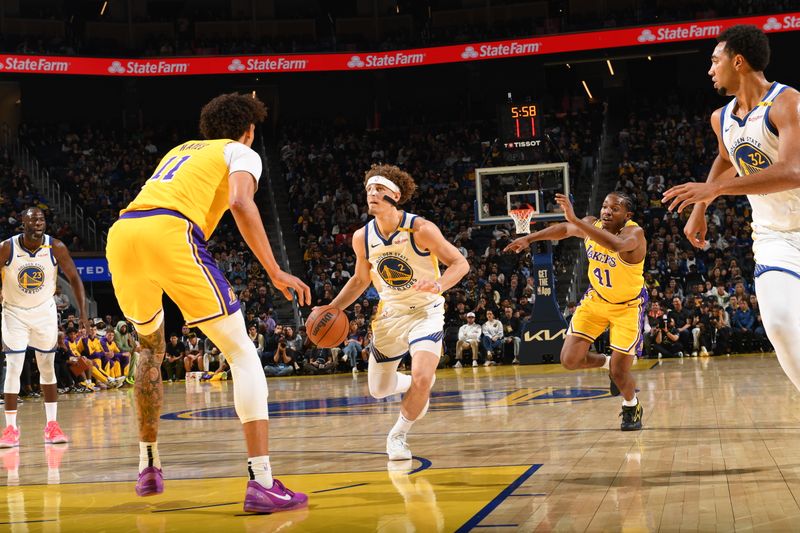 SAN FRANCISCO, CA - OCTOBER 18: Brandin Podziemski #2 of the Golden State Warriors handles the ball during the game against the Los Angeles Lakers during a NBA Preseason game on October 18, 2024 at Chase Center in San Francisco, California. NOTE TO USER: User expressly acknowledges and agrees that, by downloading and or using this photograph, user is consenting to the terms and conditions of Getty Images License Agreement. Mandatory Copyright Notice: Copyright 2024 NBAE (Photo by Noah Graham/NBAE via Getty Images)