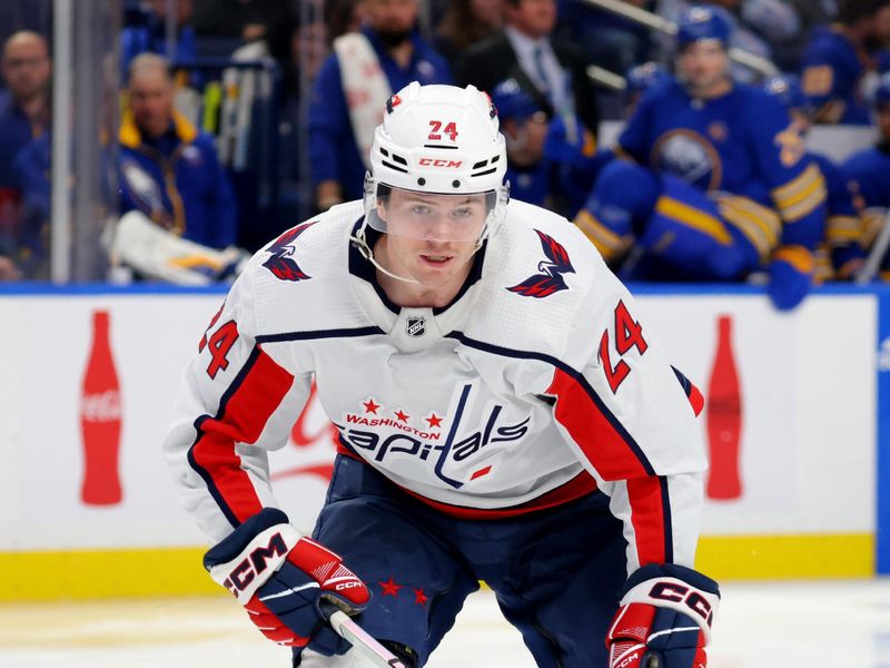 Apr 11, 2024; Buffalo, New York, USA;  Washington Capitals center Connor McMichael (24) skates to the puck during the third period against the Buffalo Sabres at KeyBank Center. Mandatory Credit: Timothy T. Ludwig-USA TODAY Sports