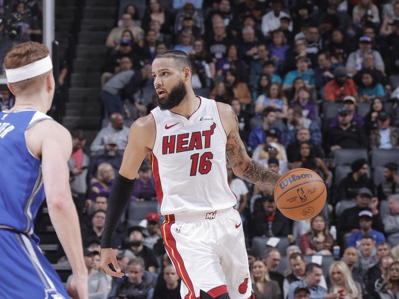 SACRAMENTO, CA - FEBRUARY 26: Caleb Martin #16 of the Miami Heat dribbles the ball during the game against the Sacramento Kings on February 26, 2024 at Golden 1 Center in Sacramento, California. NOTE TO USER: User expressly acknowledges and agrees that, by downloading and or using this Photograph, user is consenting to the terms and conditions of the Getty Images License Agreement. Mandatory Copyright Notice: Copyright 2024 NBAE (Photo by Rocky Widner/NBAE via Getty Images)