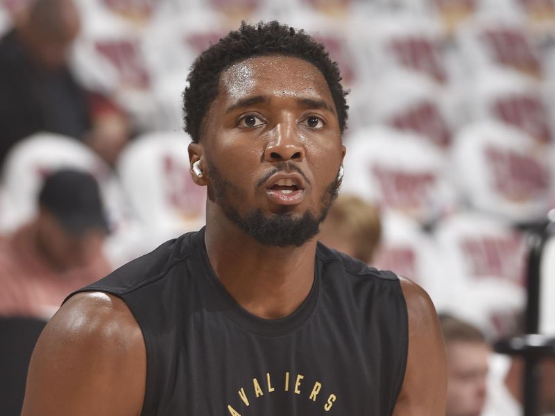 CLEVELAND, OH - OCTOBER 25: Donovan Mitchell #45 of the Cleveland Cavaliers warms up before the game against the Detroit Pistons on October 25, 2024 at Rocket Mortgage FieldHouse in Cleveland, Ohio. NOTE TO USER: User expressly acknowledges and agrees that, by downloading and/or using this Photograph, user is consenting to the terms and conditions of the Getty Images License Agreement. Mandatory Copyright Notice: Copyright 2024 NBAE (Photo by David Liam Kyle/NBAE via Getty Images)