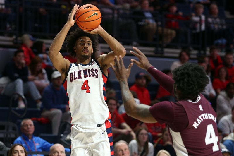 Feb 18, 2023; Oxford, Mississippi, USA; Mississippi Rebels forward Jaemyn Brakefield (4) shoots for three during the second half against the Mississippi State Bulldogs at The Sandy and John Black Pavilion at Ole Miss. Mandatory Credit: Petre Thomas-USA TODAY Sports