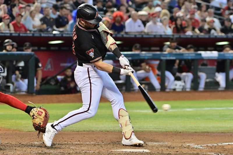 Jul 26, 2023; Phoenix, Arizona, USA;  Arizona Diamondbacks first baseman Christian Walker (53) singles in the fifth inning against the St. Louis Cardinals at Chase Field. Mandatory Credit: Matt Kartozian-USA TODAY Sports