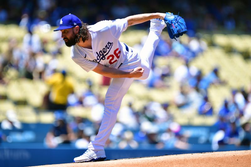 Jul 26, 2023; Los Angeles, California, USA; Los Angeles Dodgers starting pitcher Tony Gonsolin (26) throws against the Toronto Blue Jays during the first inning at Dodger Stadium. Mandatory Credit: Gary A. Vasquez-USA TODAY Sports