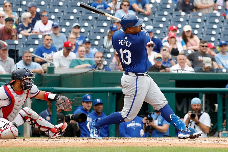 Sep 26, 2024; Washington, District of Columbia, USA; Kansas City Royals first baseman Salvador Perez (13) singles against the Washington Nationals during the third inning at Nationals Park. Mandatory Credit: Geoff Burke-Imagn Images