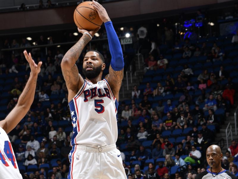 ORLANDO, FL - JANUARY 19: Marcus Morris Sr. #5 of the Philadelphia 76ers shoots the ball during the game against the Orlando Magic on January 19, 2024 at the Kia Center in Orlando, Florida. NOTE TO USER: User expressly acknowledges and agrees that, by downloading and or using this photograph, User is consenting to the terms and conditions of the Getty Images License Agreement. Mandatory Copyright Notice: Copyright 2024 NBAE (Photo by Fernando Medina/NBAE via Getty Images)