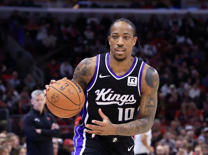 CHICAGO, ILLINOIS - JANUARY 12: DeMar DeRozan #10 of the Sacramento Kings brings the ball up the court against the Chicago Bulls during the first half at the United Center on January 12, 2025 in Chicago, Illinois. NOTE TO USER: User expressly acknowledges and agrees that, by downloading and or using this photograph, User is consenting to the terms and conditions of the Getty Images License Agreement. (Photo by Justin Casterline/Getty Images)