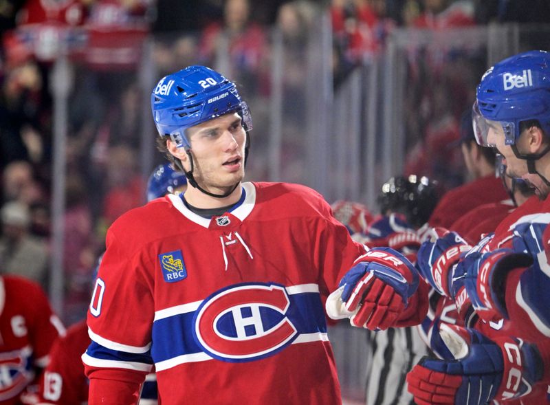 Dec 20, 2025; Montreal, Quebec, CAN; Montreal Canadiens forward Juraj Slafkovsky (20) celebrates with teammates after scoring a goal against the Pittsburgh Penguins during the first period at the Bell Centre. Mandatory Credit: Eric Bolte-Imagn Images