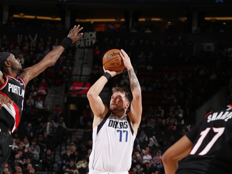 PORTLAND, OR - DECEMBER 1: Luka Doncic #77 of the Dallas Mavericks shoots a three point basket during the game against the Portland Trail Blazers on December 1, 2024 at the Moda Center Arena in Portland, Oregon. NOTE TO USER: User expressly acknowledges and agrees that, by downloading and or using this photograph, user is consenting to the terms and conditions of the Getty Images License Agreement. Mandatory Copyright Notice: Copyright 2024 NBAE (Photo by Cameron Browne/NBAE via Getty Images)