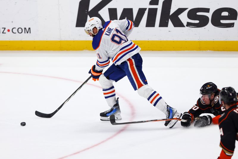 Feb 9, 2024; Anaheim, California, USA; Edmonton Oilers left wing Evander Kane (91) skates with the puck on a breakaway during the third period of a game against the Anaheim Ducks at Honda Center. Mandatory Credit: Jessica Alcheh-USA TODAY Sports