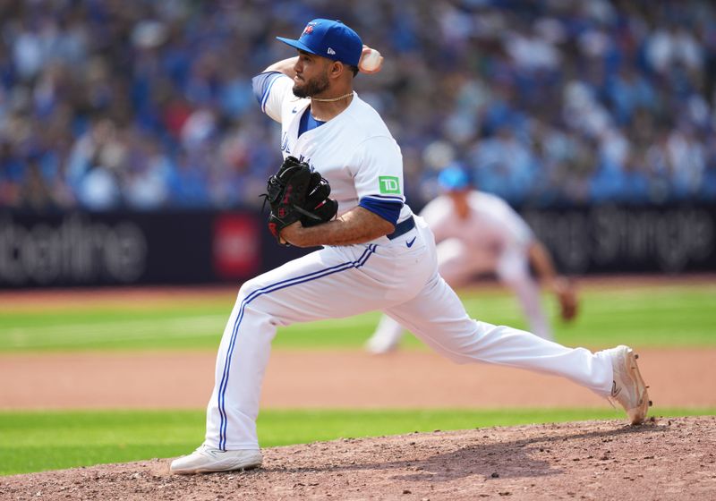 Jul 16, 2023; Toronto, Ontario, CAN; Toronto Blue Jays relief pitcher Yimi Garcia (93) throws a pitch against the Arizona Diamondbacks during the eighth inning at Rogers Centre. Mandatory Credit: Nick Turchiaro-USA TODAY Sports