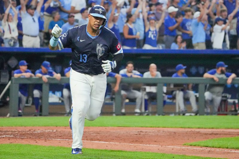 Jul 26, 2024; Kansas City, Missouri, USA;  Kansas City Royals catcher Salvador Perez (13) celebrates toward fans against the Chicago Cubs after hitting a 3 run home run in the sixth inning at Kauffman Stadium. Mandatory Credit: Denny Medley-USA TODAY Sports