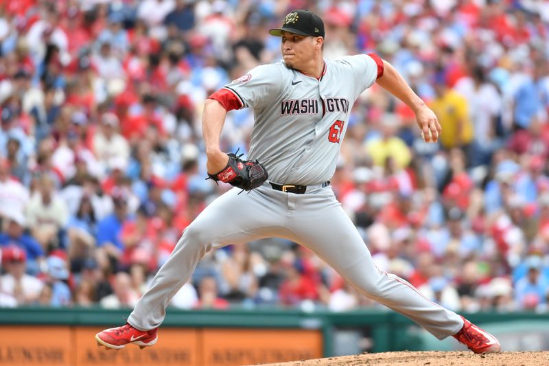 May 19, 2024; Philadelphia, Pennsylvania, USA; Washington Nationals pitcher Robert Garcia (61) throws a pitch against the Philadelphia Phillies during the fifth inning at Citizens Bank Park. Mandatory Credit: Eric Hartline-USA TODAY Sports