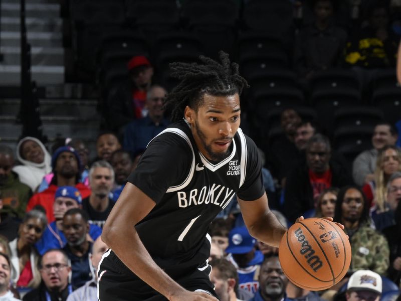 PHILADELPHIA, PA - OCTOBER 16:  Ziaire Williams #1 of the Brooklyn Nets dribbles the ball during the game against the Philadelphia 76ers on October 16, 2024 at the Wells Fargo Center in Philadelphia, Pennsylvania NOTE TO USER: User expressly acknowledges and agrees that, by downloading and/or using this Photograph, user is consenting to the terms and conditions of the Getty Images License Agreement. Mandatory Copyright Notice: Copyright 2024 NBAE (Photo by David Dow/NBAE via Getty Images)