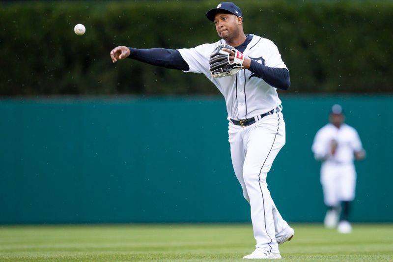 Apr 11, 2022; Detroit, Michigan, USA; Detroit Tigers second baseman Jonathan Schoop (7) makes a throw to first base for an out during the fifth inning against the Boston Red Sox at Comerica Park. Mandatory Credit: Raj Mehta-USA TODAY Sports