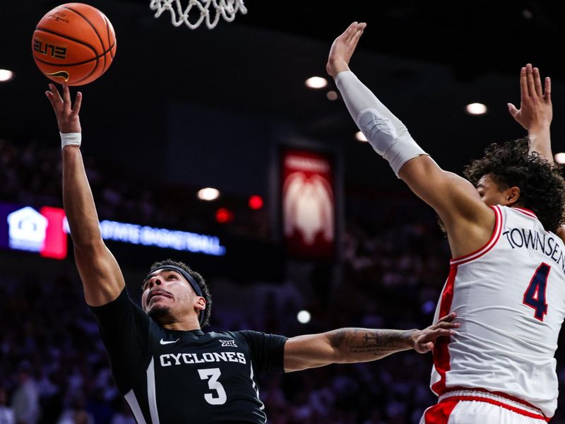 Jan 27, 2025; Tucson, Arizona, USA; Iowa State guard Tamin Lipsey (3) shoots against Arizona Wildcats forward Trey Townsend (4) during the first half at McKale Center. Mandatory Credit: Aryanna Frank-Imagn Images