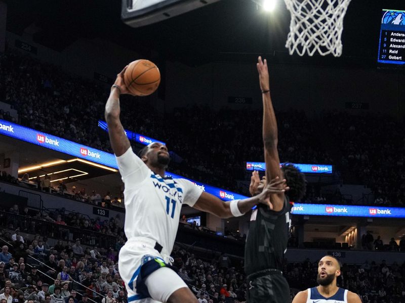 MINNEAPOLIS, MN -  FEBRUARY 4: Naz Reid #11 of the Minnesota Timberwolves dunks the ball during the game against the Houston Rockets on February 4, 2024 at Target Center in Minneapolis, Minnesota. NOTE TO USER: User expressly acknowledges and agrees that, by downloading and or using this Photograph, user is consenting to the terms and conditions of the Getty Images License Agreement. Mandatory Copyright Notice: Copyright 2024 NBAE (Photo by Jordan Johnson/NBAE via Getty Images)