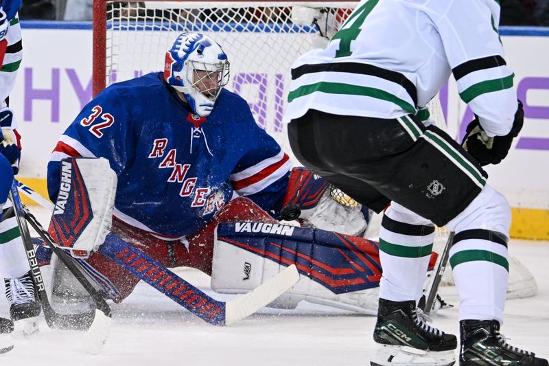 Jan 7, 2025; New York, New York, USA;  New York Rangers goaltender Jonathan Quick (32) makes a save against the Dallas Stars during the second period at Madison Square Garden. Mandatory Credit: Dennis Schneidler-Imagn Images