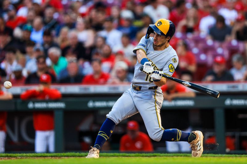 Jun 3, 2025; Cincinnati, Ohio, USA; Milwaukee Brewers outfielder Sal Frelick (10) hits a solo home run in the fourth inning against the Cincinnati Reds at Great American Ball Park. Mandatory Credit: Katie Stratman-Imagn Images