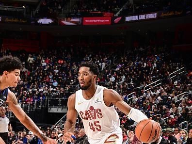 DETROIT, MI - DECEMBER 2: Donovan Mitchell #45 of the Cleveland Cavaliers goes to the basket during the game  on December 2, 2023 at Little Caesars Arena in Detroit, Michigan. NOTE TO USER: User expressly acknowledges and agrees that, by downloading and/or using this photograph, User is consenting to the terms and conditions of the Getty Images License Agreement. Mandatory Copyright Notice: Copyright 2023 NBAE (Photo by Chris Schwegler/NBAE via Getty Images)