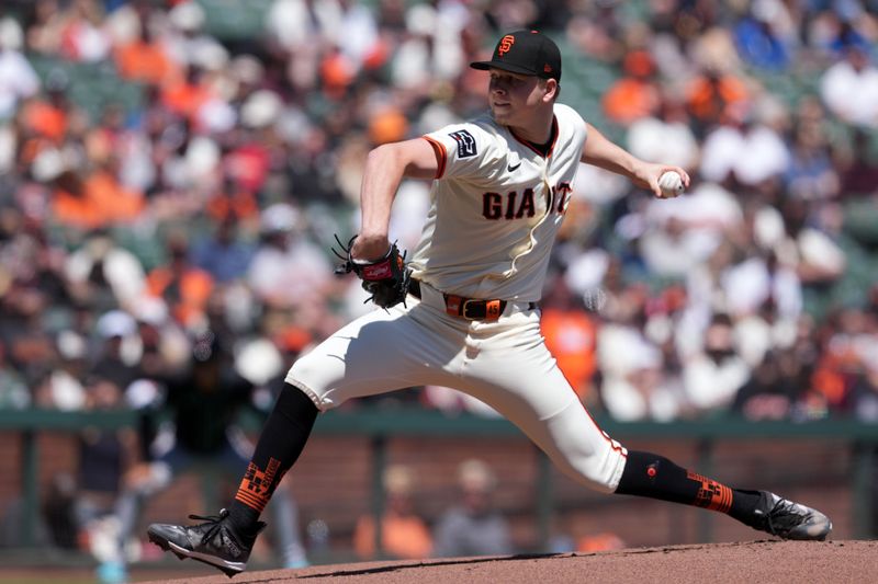Apr 20, 2024; San Francisco, California, USA; San Francisco Giants pitcher Kyle Harrison (45) throws a pitch against the Arizona Diamondbacks during the first inning at Oracle Park. Mandatory Credit: Darren Yamashita-USA TODAY Sports