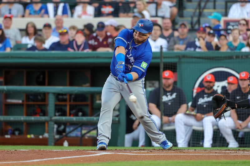 Mar 7, 2024; Lakeland, Florida, USA; Toronto Blue Jays designated hitter Daniel Vogelbach (20) bats during the first inning against the Detroit Tigers at Publix Field at Joker Marchant Stadium. Mandatory Credit: Mike Watters-USA TODAY Sports