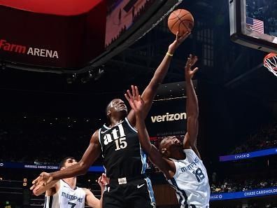 ATLANTA, GA - DECEMBER 23: Clint Capela #15 of the Atlanta Hawks rebounds during the game against the Memphis Grizzlies on December 23, 2023 at State Farm Arena in Atlanta, Georgia.  NOTE TO USER: User expressly acknowledges and agrees that, by downloading and/or using this Photograph, user is consenting to the terms and conditions of the Getty Images License Agreement. Mandatory Copyright Notice: Copyright 2023 NBAE (Photo by Scott Cunningham/NBAE via Getty Images)