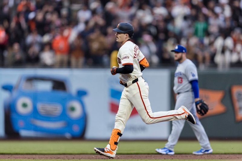 May 15, 2024; San Francisco, California, USA; San Francisco Giants right fielder Mike Yastrzemski (5) runs the bases after hitting a two-run home run against the Los Angeles Dodgers during the third inning at Oracle Park. Mandatory Credit: John Hefti-USA TODAY Sports