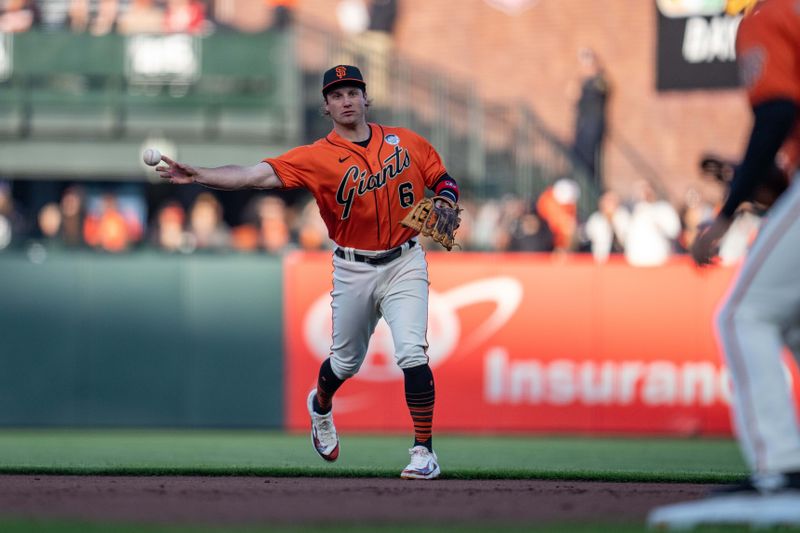 Jun 2, 2023; San Francisco, California, USA; San Francisco Giants second baseman Casey Schmitt (6) throws out Baltimore Orioles catcher Adley Rutschman (not pictured) during the first inning during the first inning at Oracle Park. Mandatory Credit: Neville E. Guard-USA TODAY Sports