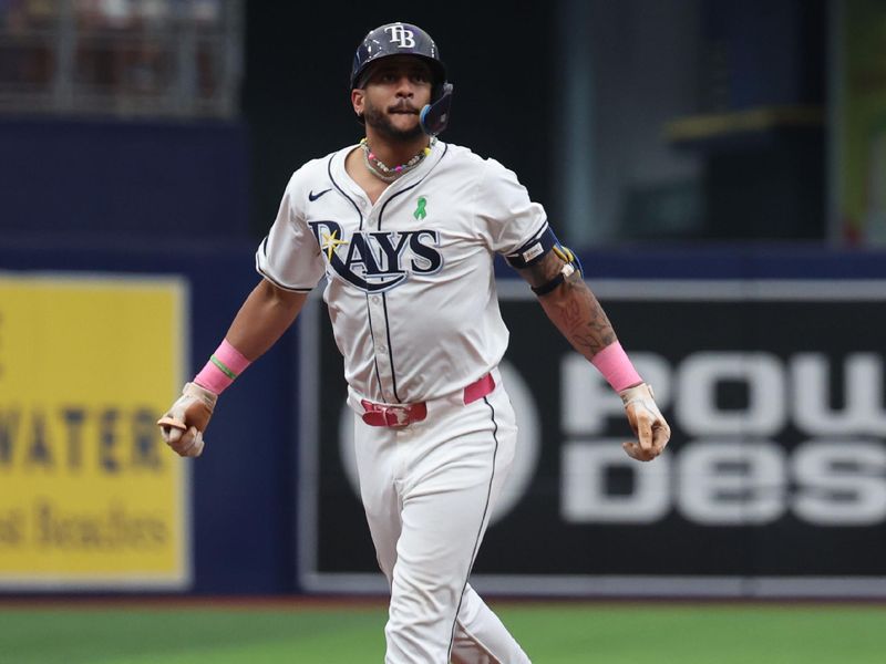 May 30, 2024; St. Petersburg, Florida, USA;  Tampa Bay Rays outfielder Jose Siri (22) runs round the bases after he hits a home run against the Oakland Athletics during the ninth inning at Tropicana Field. Mandatory Credit: Kim Klement Neitzel-USA TODAY Sports